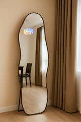 black wavy mirror